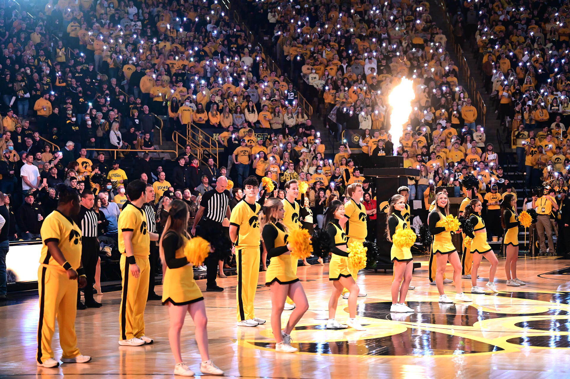 Fans and cheerleader wait on the player introductions before a college basketball game between the Penn State Nittany Lions and the Iowa Hawkeyes on January 22, 2022, at Carver-Hawkeye Arena, Iowa City, IA.