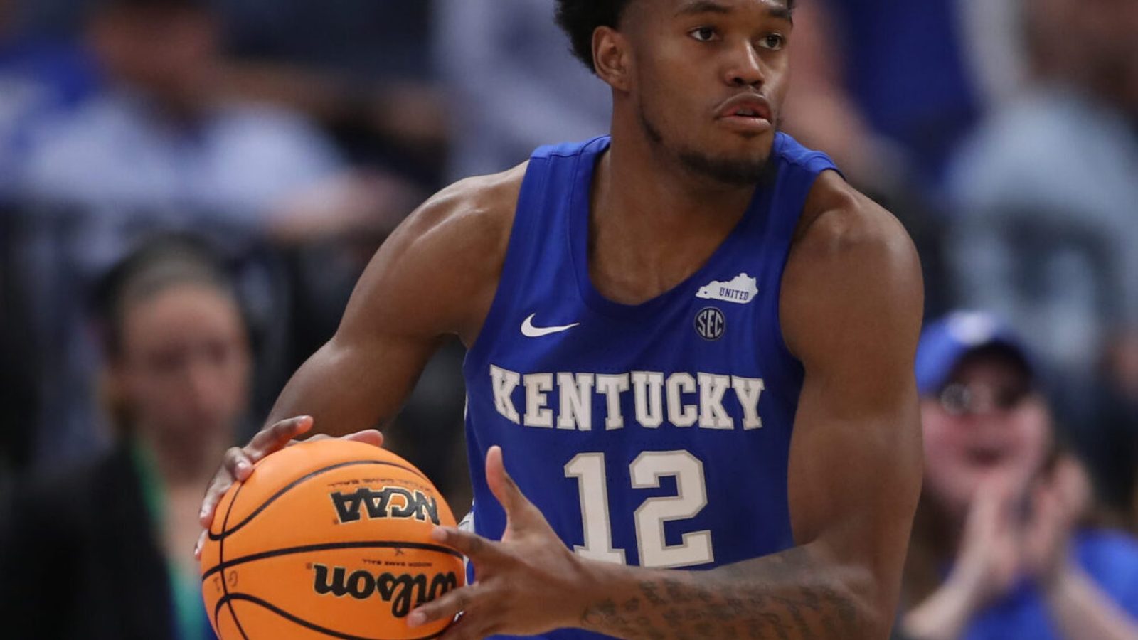 Kentucky Wildcats forward Keion Brooks Jr. (12) moves the ball around the perimeter during the SEC Tournament between the Kentucky Wildcats and the Tennessee Volunteers on Thursday, March 11, 2022 at the Amalie Arena in Tampa, FL