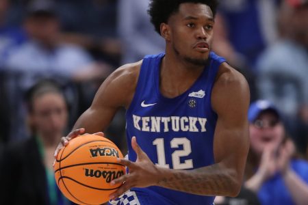 Kentucky Wildcats forward Keion Brooks Jr. (12) moves the ball around the perimeter during the SEC Tournament between the Kentucky Wildcats and the Tennessee Volunteers on Thursday, March 11, 2022 at the Amalie Arena in Tampa, FL