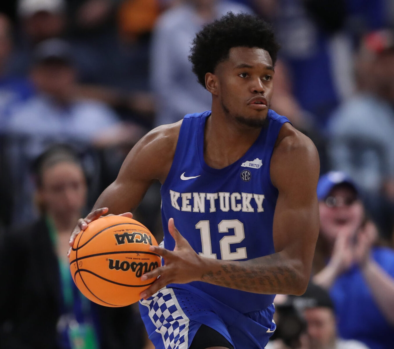 Kentucky Wildcats forward Keion Brooks Jr. (12) moves the ball around the perimeter during the SEC Tournament between the Kentucky Wildcats and the Tennessee Volunteers on Thursday, March 11, 2022 at the Amalie Arena in Tampa, FL