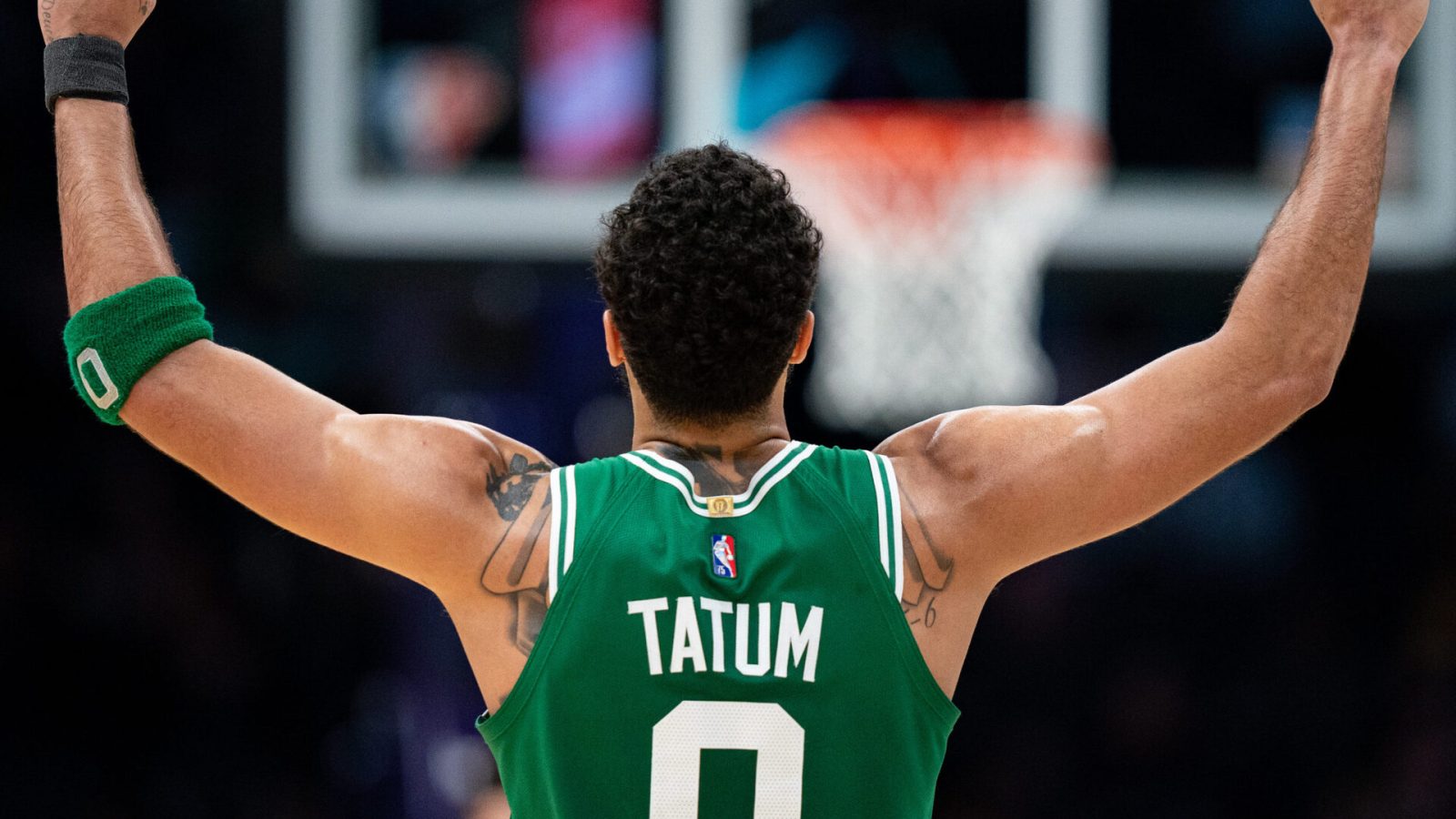Jayson Tatum #0 of the Boston Celtics celebrates in the fourth quarter during their game against the Charlotte Hornets at Spectrum Center on March 09, 2022 in Charlotte, North Carolina