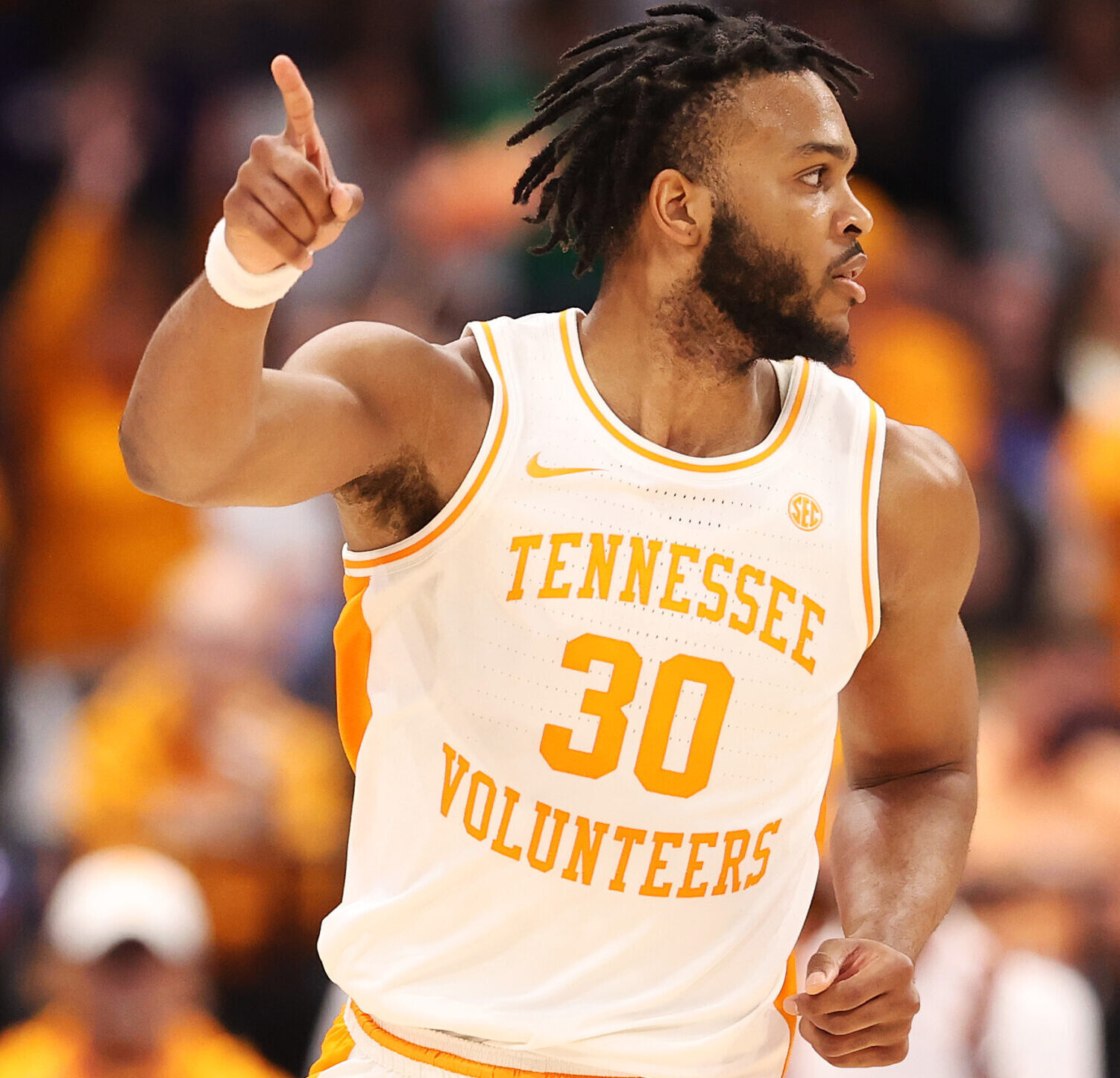 Josiah-Jordan James #30 of the Tennessee Volunteers reacts during the second half against the Texas A&M Aggies in the Championship game of the SEC Men's Tournament at Amalie Arena on March 13, 2022 in Tampa, Florida.