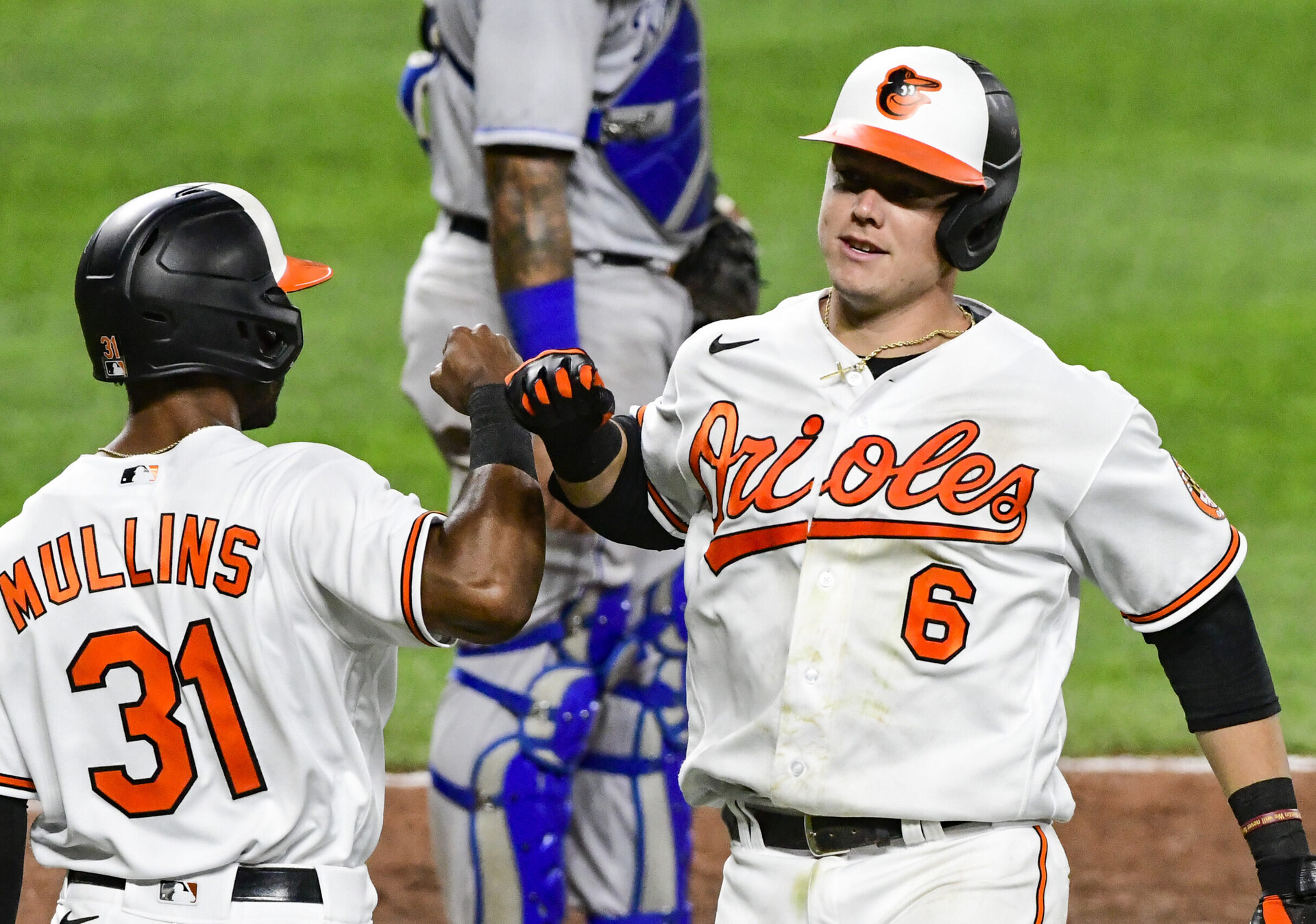 Baltimore Orioles third baseman Ryan Mountcastle (left) celebrates a home run by forearm bashing Baltimore Orioles center fielder Cedric Mullins during a game against the Kansas City Royals
