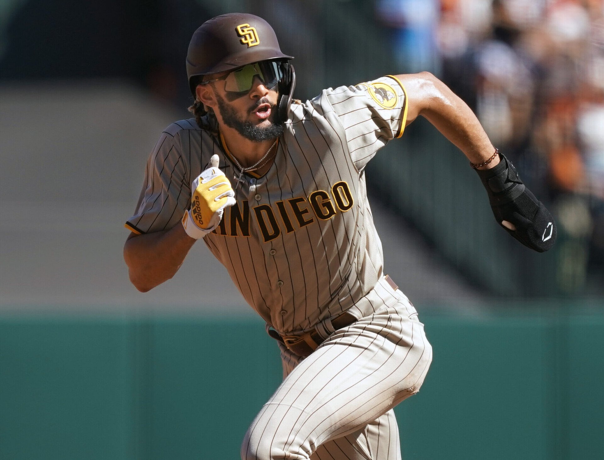 San Diego Padres shortstop Fernando Tatis Jr. runs to third base during the fourth inning against the San Francisco Giants