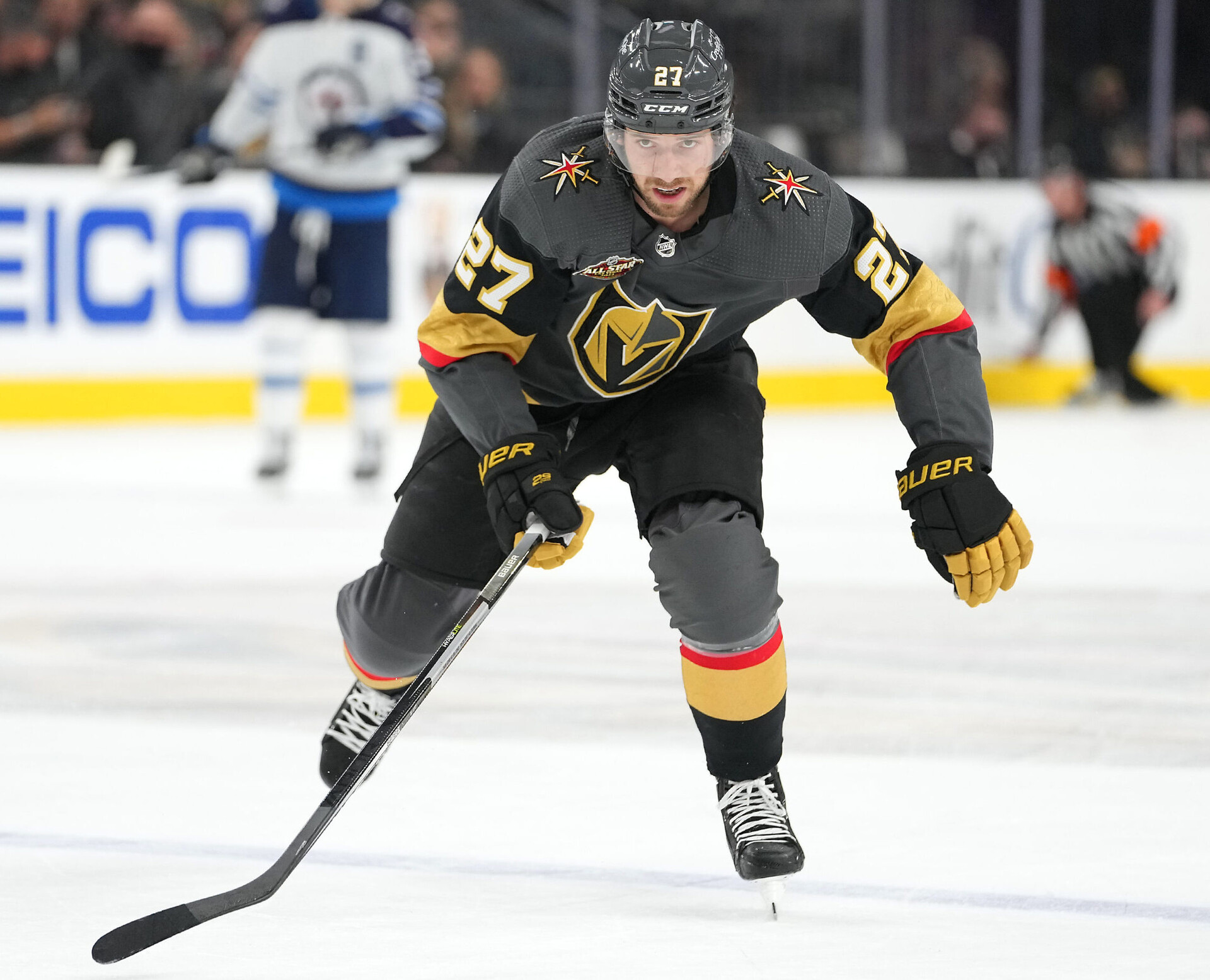 Shea Theodore chases after the puck against the Winnipeg Jets