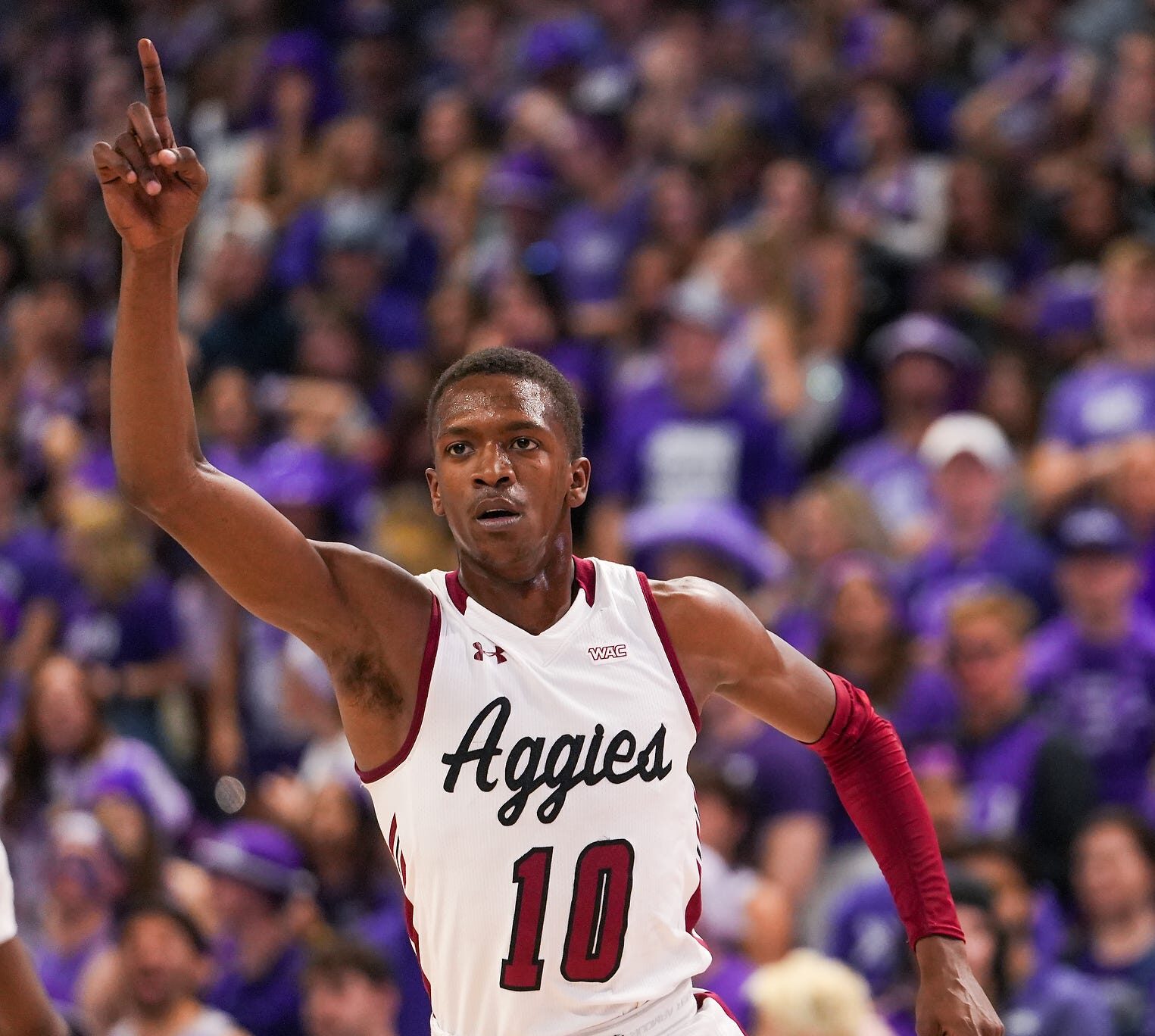 New Mexico State Aggies guard Sir'Jabari Rice (10) celebrates at the end of half time against Grand Canyon University on Saturday, Feb. 19, 2022, in Phoenix. GCU lost the game 82 to 66.