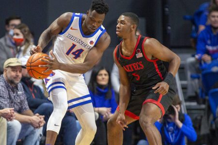 San Diego State Aztecs guard Lamont Butler (right) defends as Boise State Broncos guard Emmanuel Akot (left) tries to control the basketball with both hands during a Mountain West Conference basketball game