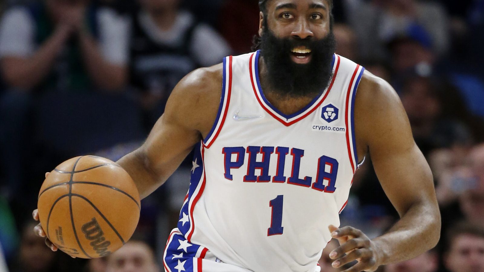 Philadelphia 76ers guard James Harden dribbles the ball up court against the Minnesota Timberwolves