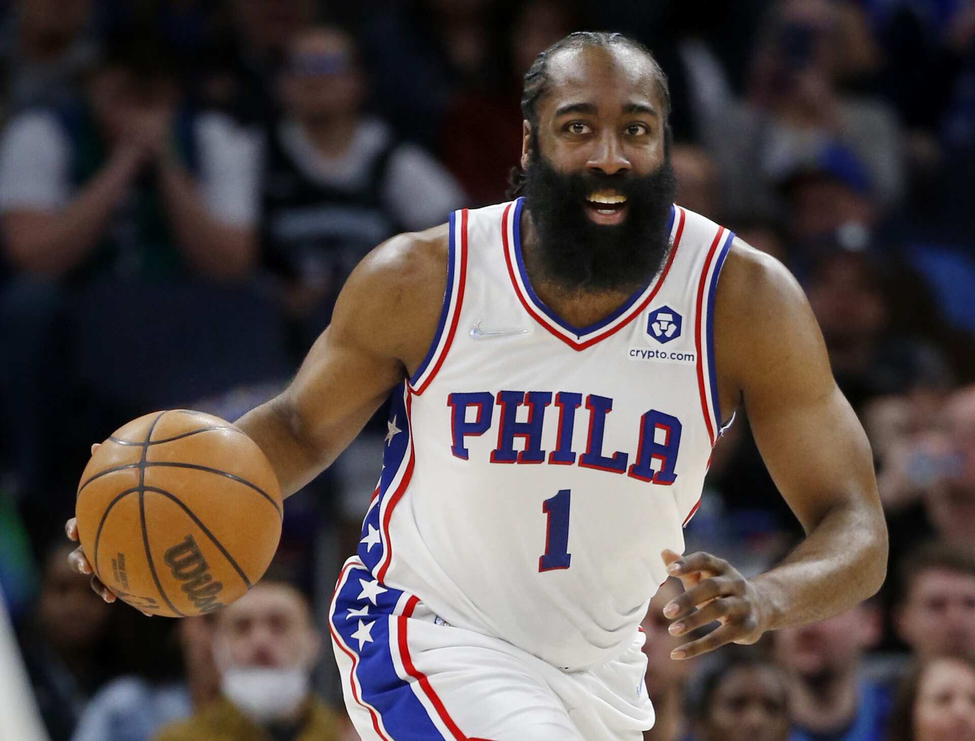Philadelphia 76ers guard James Harden dribbles the ball up court against the Minnesota Timberwolves