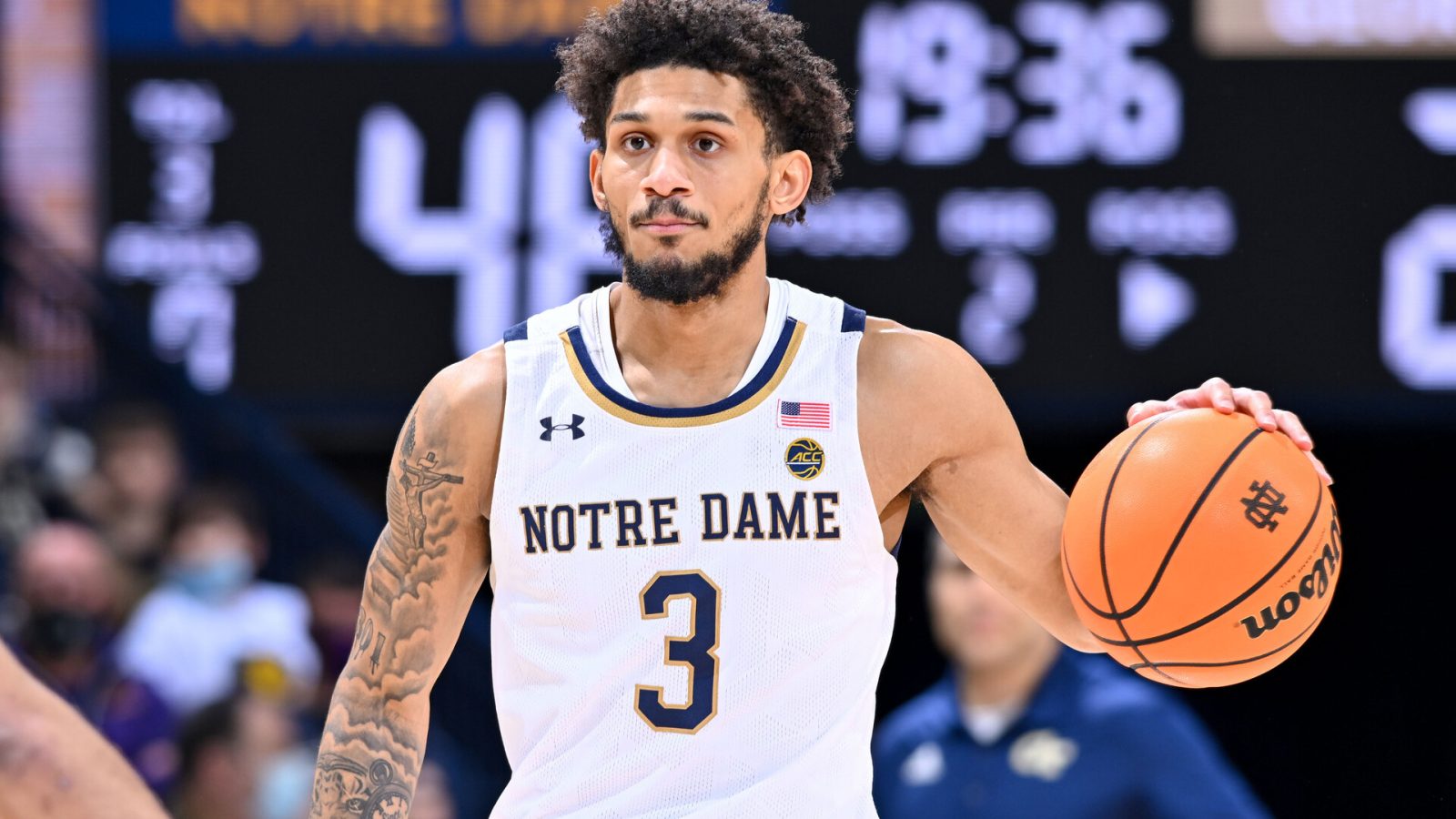 Notre Dame Fighting Irish guard Prentiss Hubb dribbles the basketball with his left hand against the Georgia Tech Yellow Jackets during an ACC game