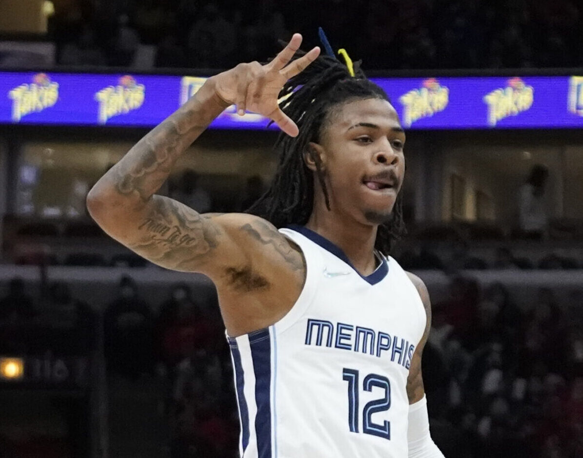 Memphis Grizzlies guard Ja Morant celebrates a three-point basket against the Chicago Bulls