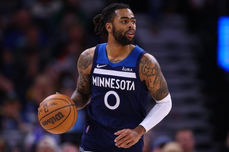 Minnesota Timberwolves guard D'Angelo Russell dribbles the ball during a game against the Golden State Warriors