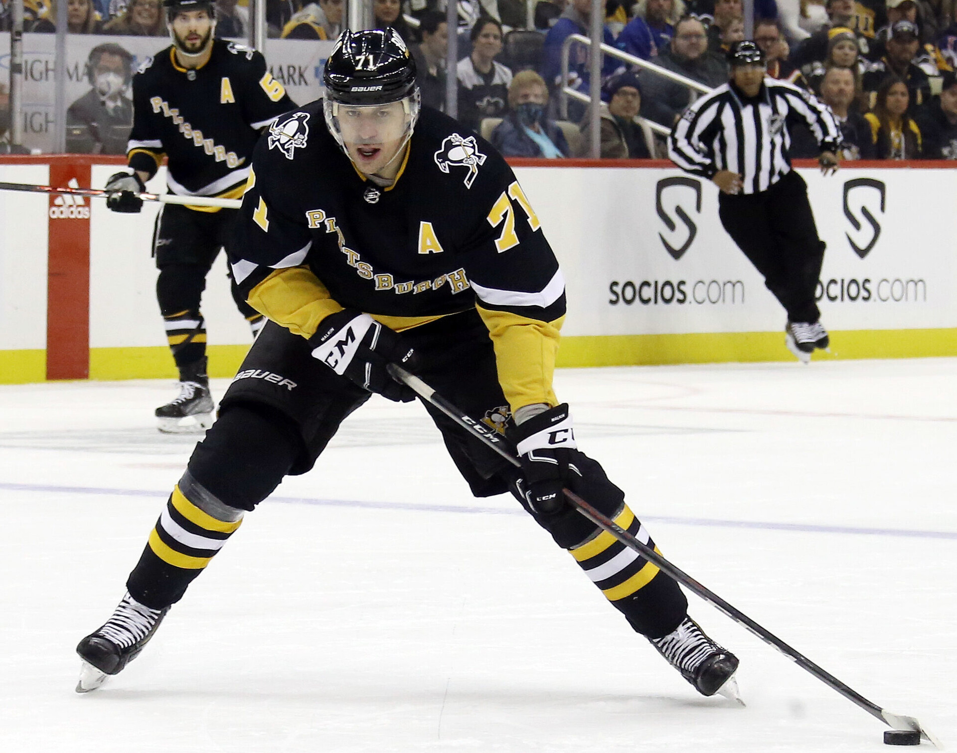 Pittsburgh Penguins center Evgeni Malkin skates with the puck against the New York Rangers