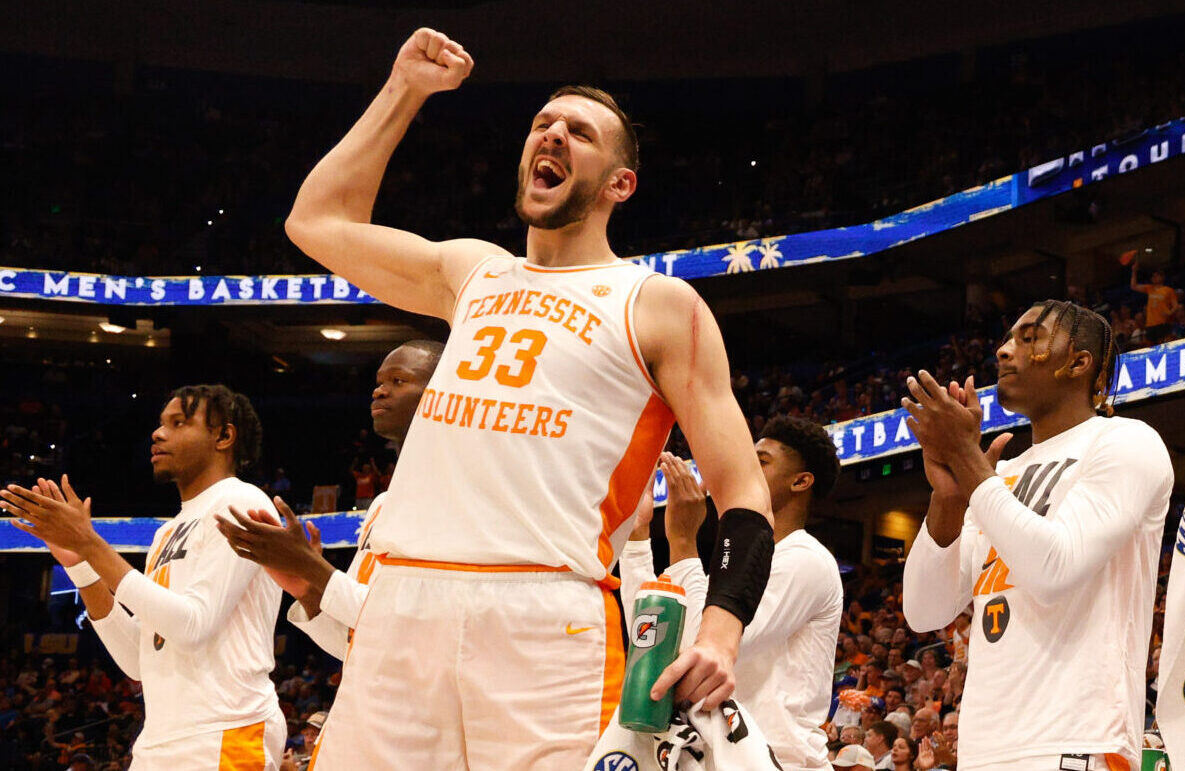 Tennessee Volunteers basketball players celebrate near the end of their victory in the SEC tournament championship