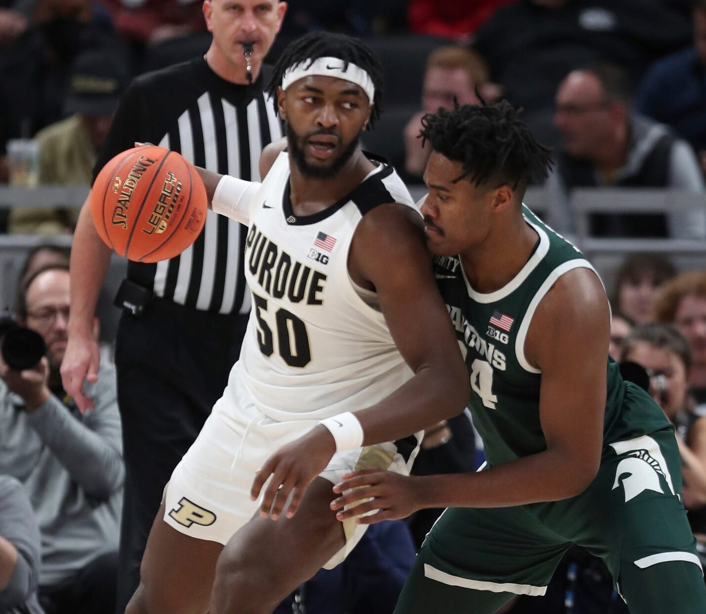 Michigan State forward Julius Marble II defends against Purdue forward Trevion Williams during the first half of MSU's 75-70 loss in the Big Ten tournament semifinal on Saturday, March 12, 2022, in Indianapolis.