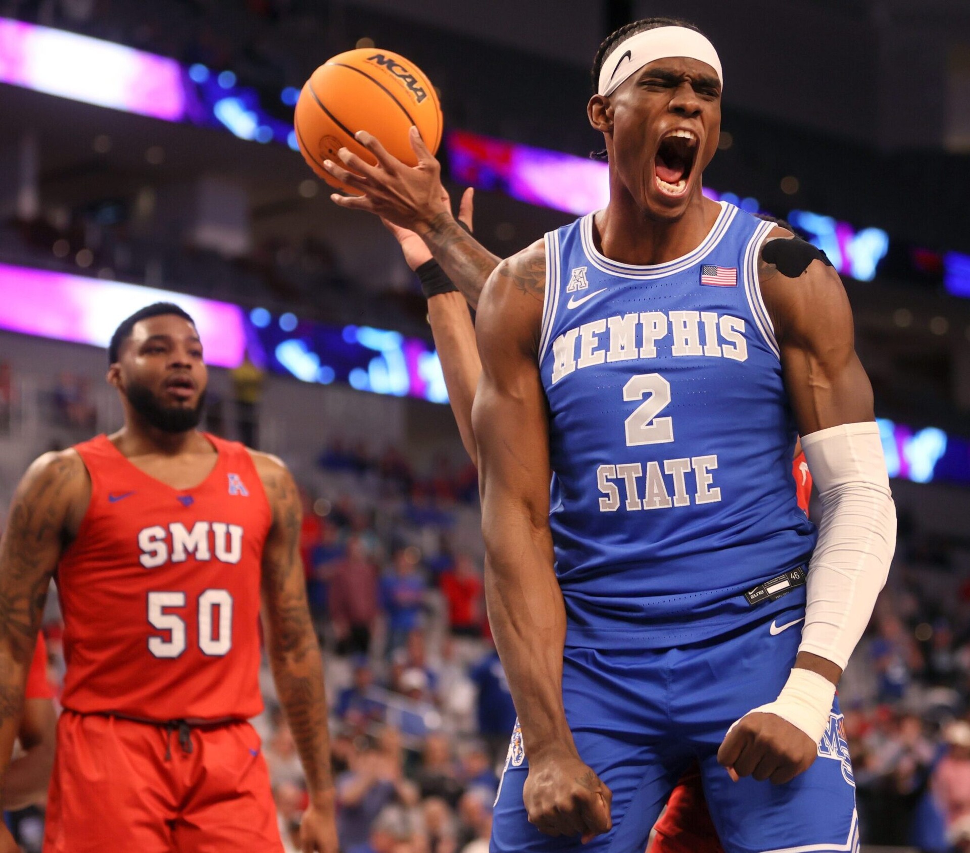 Memphis Tigers center Jalen Duren screams out in celebration of making a shot while being fouled against the SMU Mustangs during their AAC Tournament game at Dickies Arena in Fort Worth, TX on Saturday, March 12, 2022, in Fort Worth, Texas.