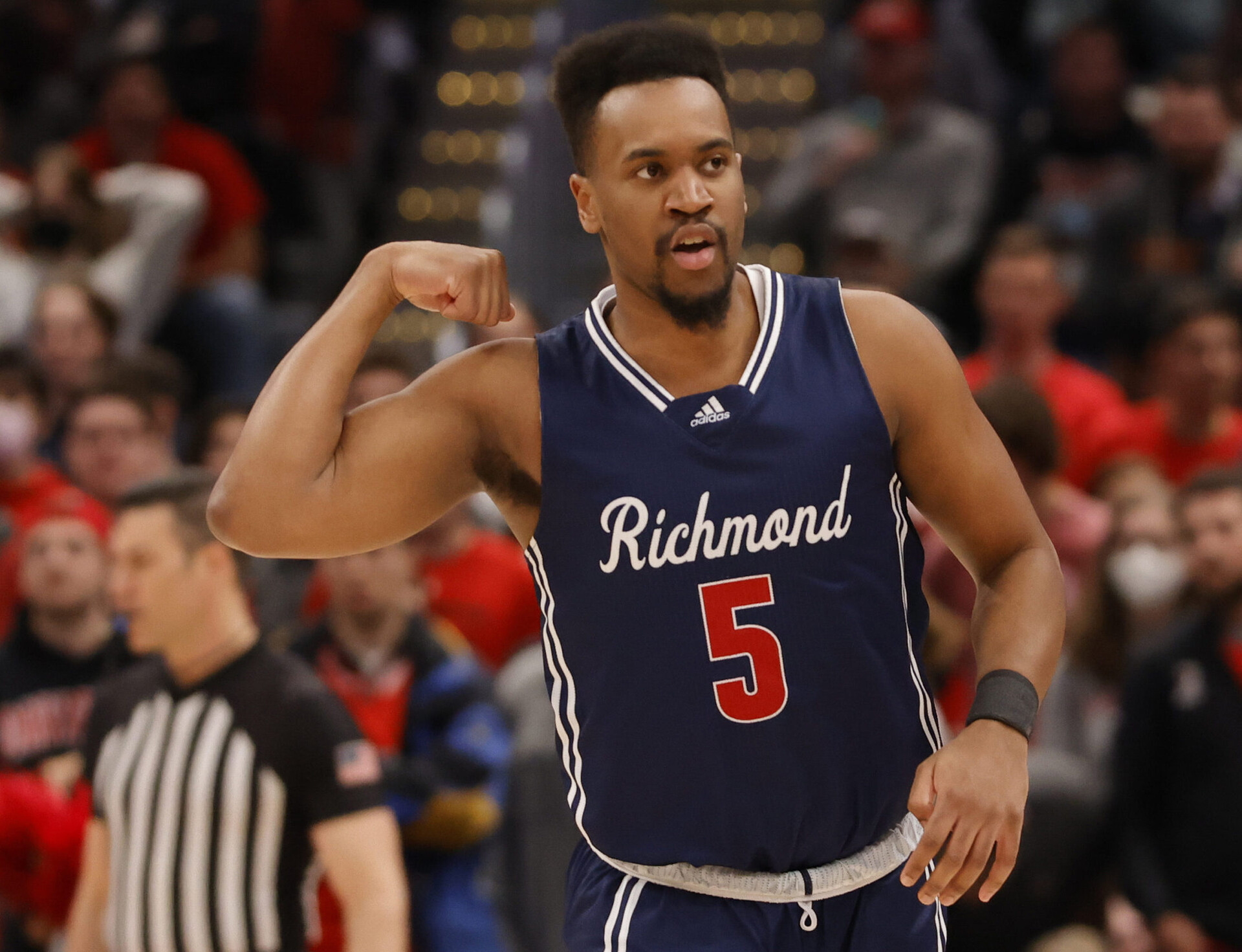 Richmond Spiders guard Nick Sherod reacts after making a basket against the Davidson Wildcats during the Atlantic 10 Conference championship game