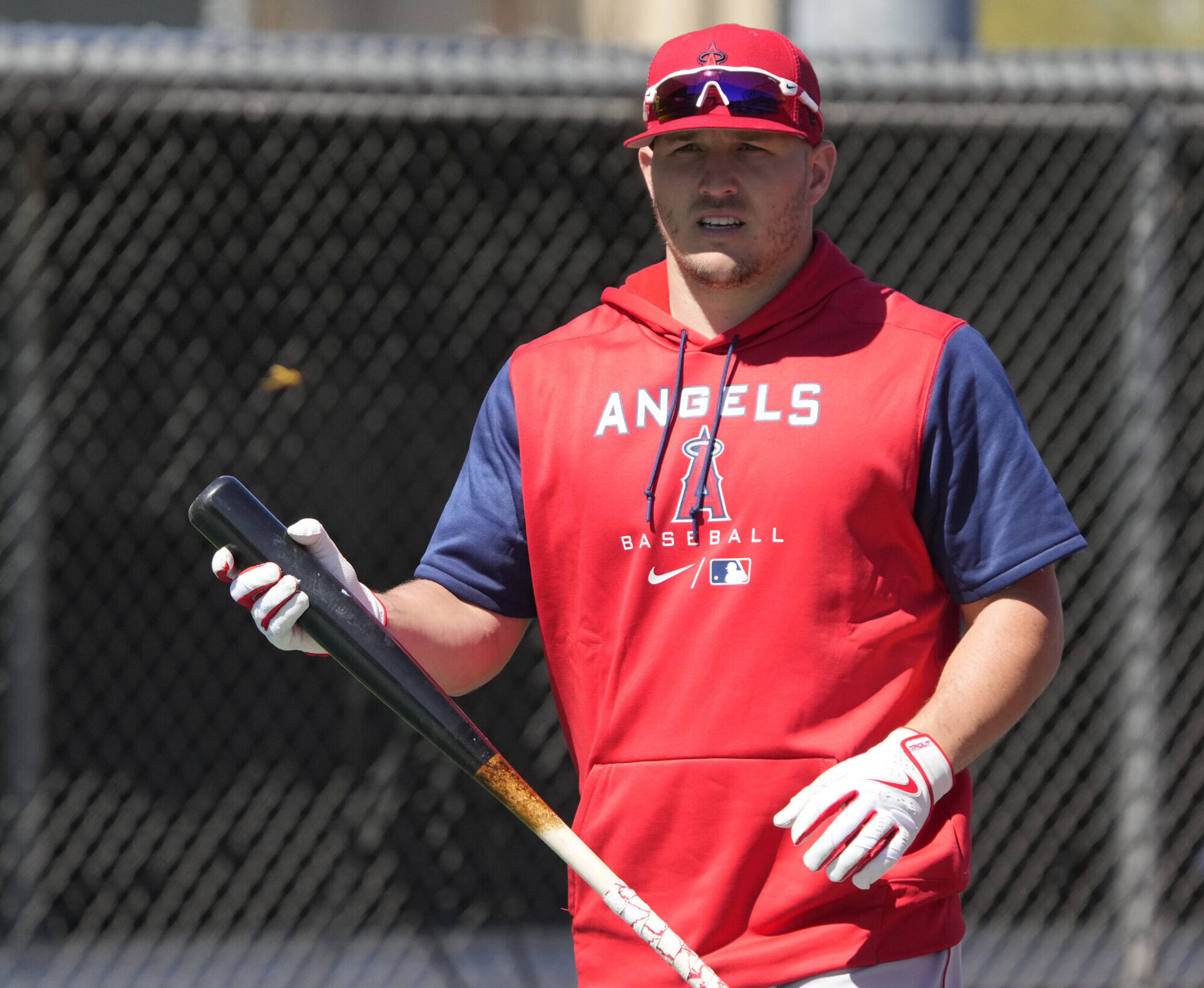Los Angeles Angels outfielder Mike Trout pauses during batting practice in spring training camp