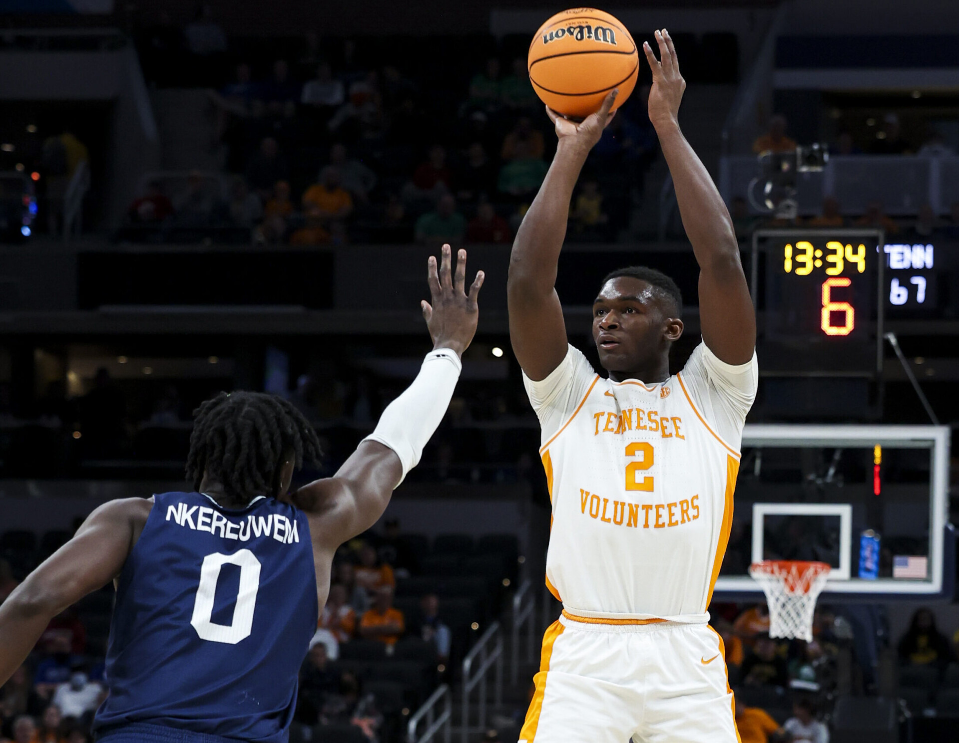Tennessee Volunteers forward Brandon Huntley-Hatfield (right) rises up and shoots the basketball with is right hand while Longwood Lancers forward Leslie Nkereuwem (left) defends during an NCAA Tournament game
