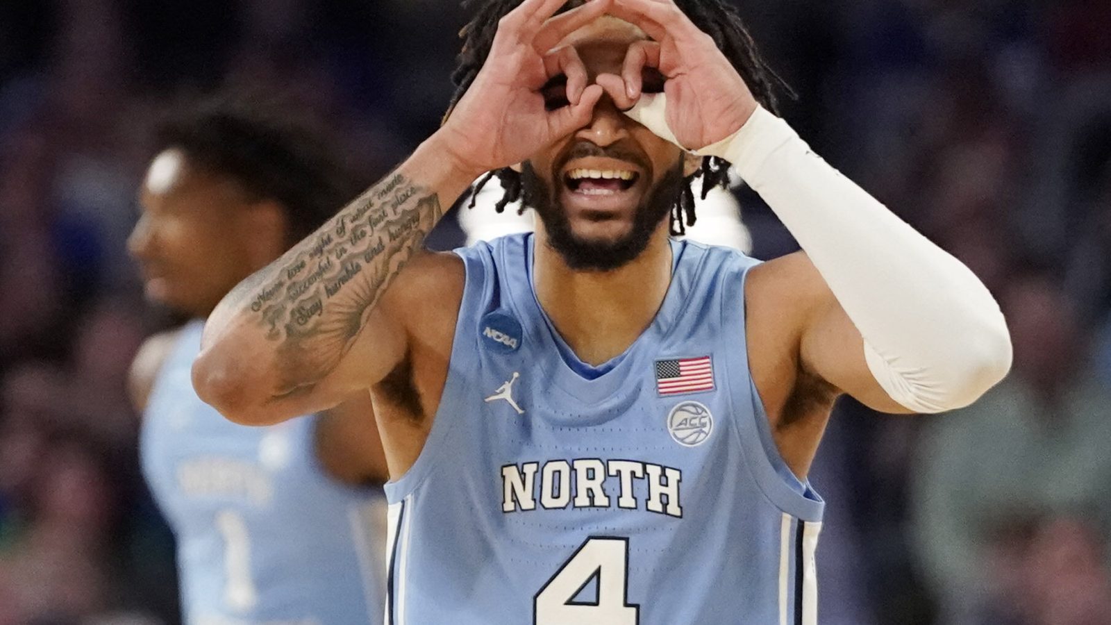 North Carolina Tar Heels guard R.J. Davis (4) celebrates a basket against the Baylor Bears during the second round of the 2022 NCAA Tournament at Dickies Arena in Fort Worth, Texas, on Sunday, March 20.