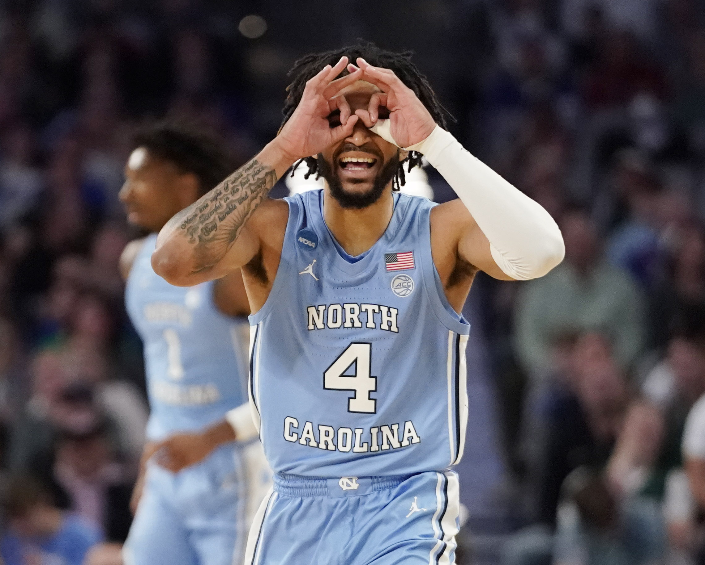 North Carolina Tar Heels guard R.J. Davis (4) celebrates a basket against the Baylor Bears during the second round of the 2022 NCAA Tournament at Dickies Arena in Fort Worth, Texas, on Sunday, March 20.