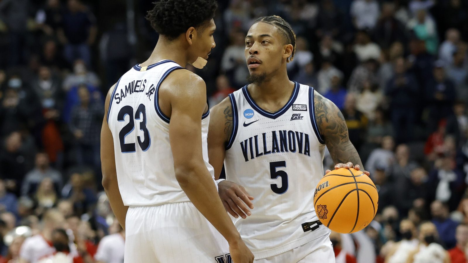 Villanova Wildcats guard Justin Moore (5) reacts with forward Jermaine Samuels (23) in the second half during the second round of the 2022 NCAA Tournament at PPG Paints Arena.
