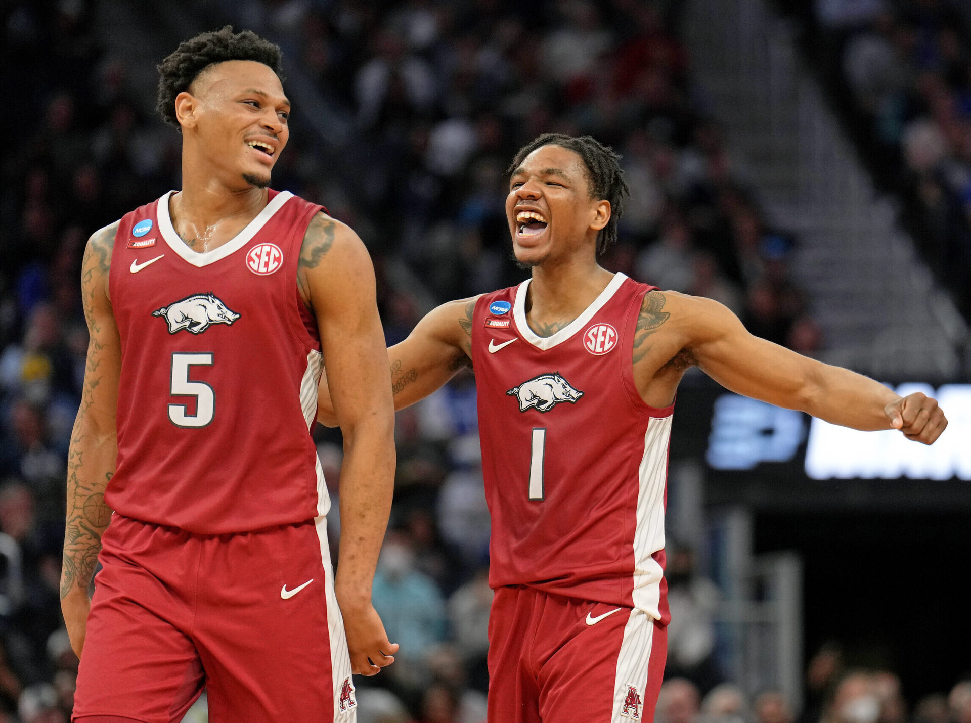 Arkansas Razorbacks guard Au'Diese Toney (5) and guard JD Notae (1) react after a play against the Gonzaga Bulldogs during the second half in the semifinals of the West regional of the men's college basketball NCAA Tournament at Chase Center. The Arkansas Razorbacks won 74-68 at Chase Center in San Francisco on Thursday, March 24, 2022.