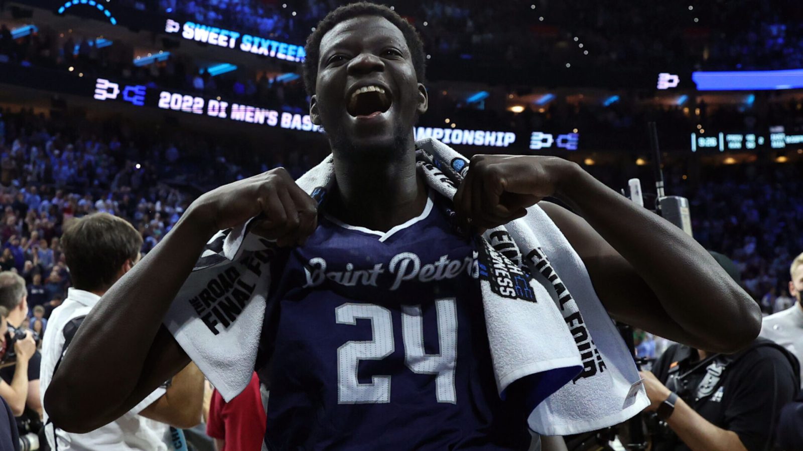 St. Peter's Peacocks forward Oumar Diahame (24) leaves the court after defeating the Purdue Boilermakers in the semifinals of the East regional of the men's college basketball NCAA Tournament at Wells Fargo Center in Philadelphia on Friday, March 25, 2022.