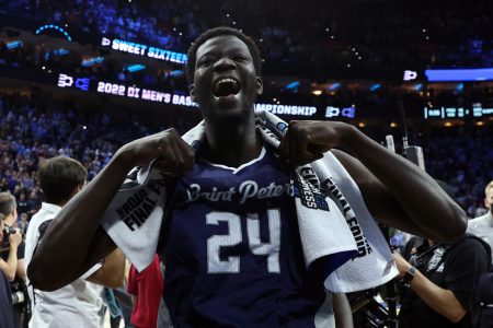 St. Peter's Peacocks forward Oumar Diahame (24) leaves the court after defeating the Purdue Boilermakers in the semifinals of the East regional of the men's college basketball NCAA Tournament at Wells Fargo Center in Philadelphia on Friday, March 25, 2022.