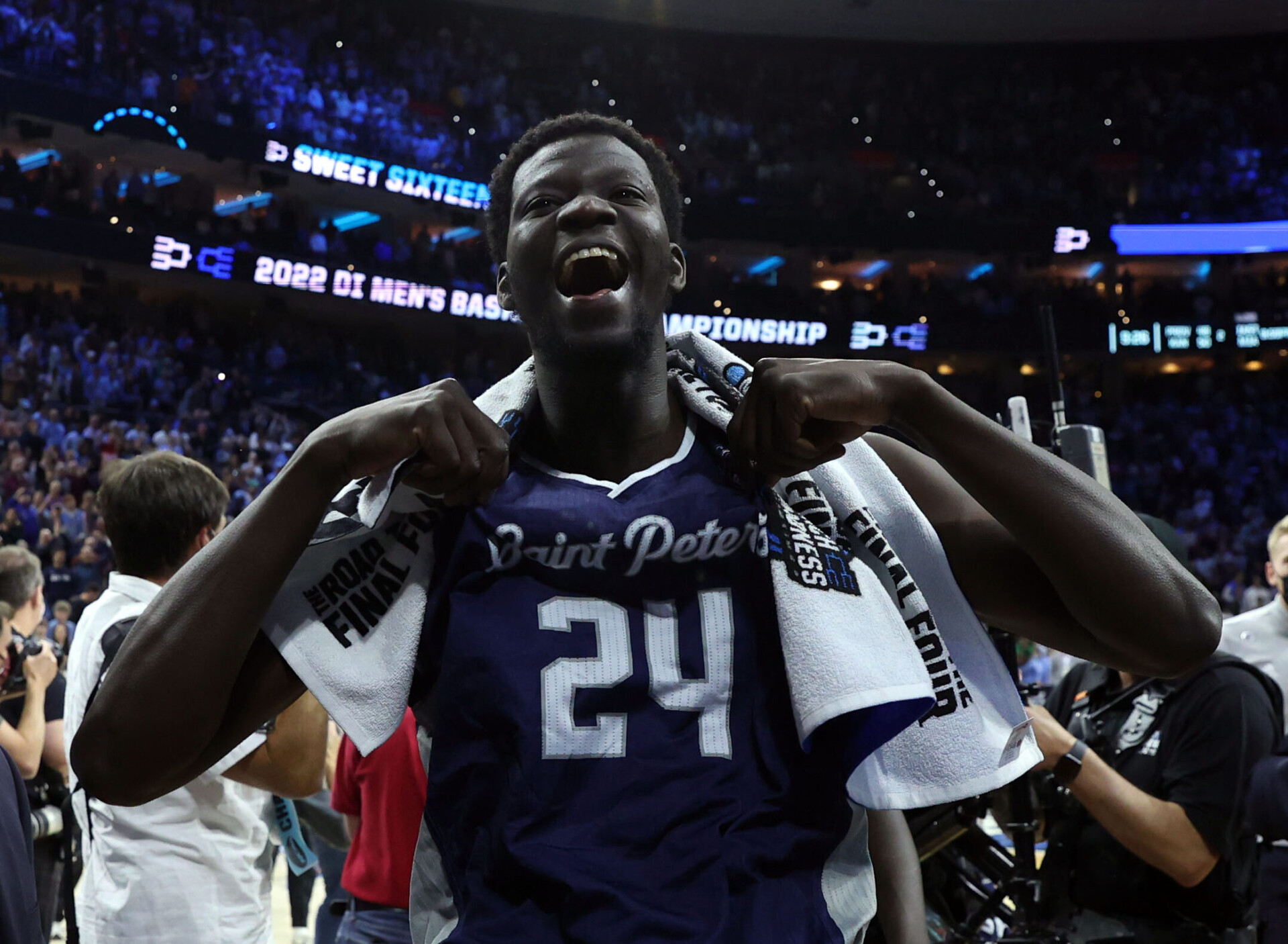 St. Peter's Peacocks forward Oumar Diahame (24) leaves the court after defeating the Purdue Boilermakers in the semifinals of the East regional of the men's college basketball NCAA Tournament at Wells Fargo Center in Philadelphia on Friday, March 25, 2022.