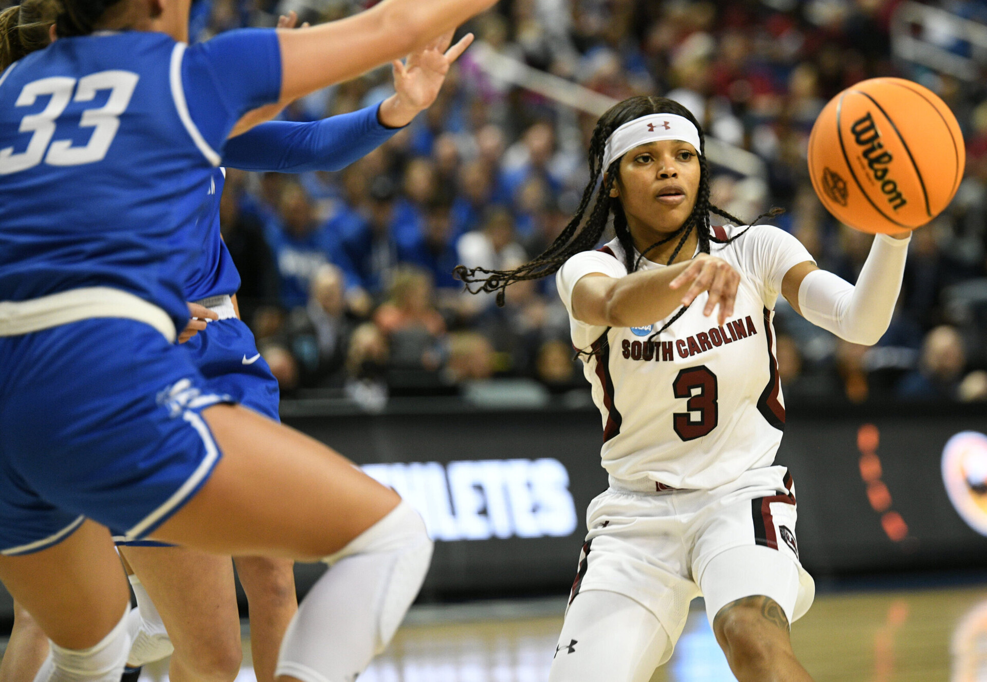 South Carolina Gamecocks guard Destanni Henderson passes the ball against the Creighton Bluejays during the Greensboro regional finals of the women's college basketball NCAA Tournament