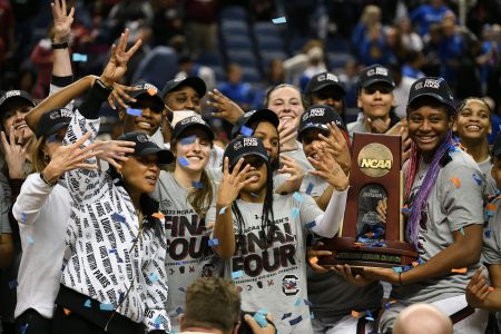 The South Carolina Gamecocks celebrate a trip to the NCAA Women's Final Four after winning the Greensboro Region with a victory over Creighton