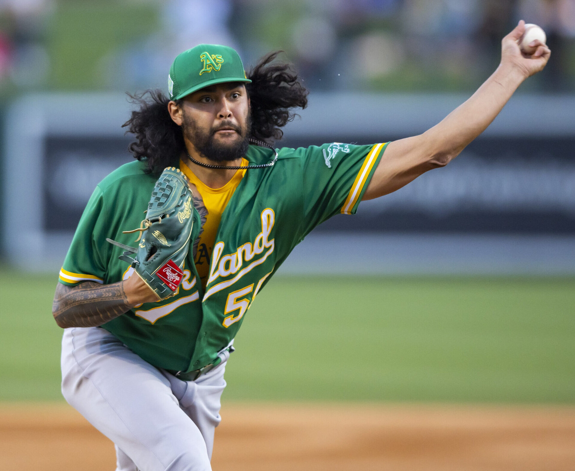 Oakland Athletics left-handed pitcher Sean Manaea delivers a pitch from the mound during a spring training game against the Los Angeles Dodgers