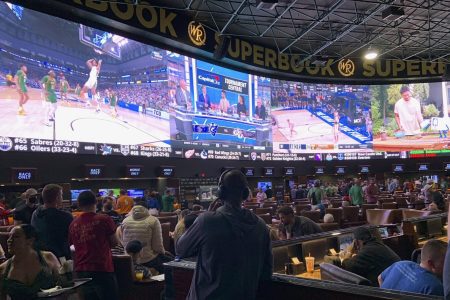 Fans pack the Westgate Las Vegas Sports book during the first day of the 2022 NCAA Tournament