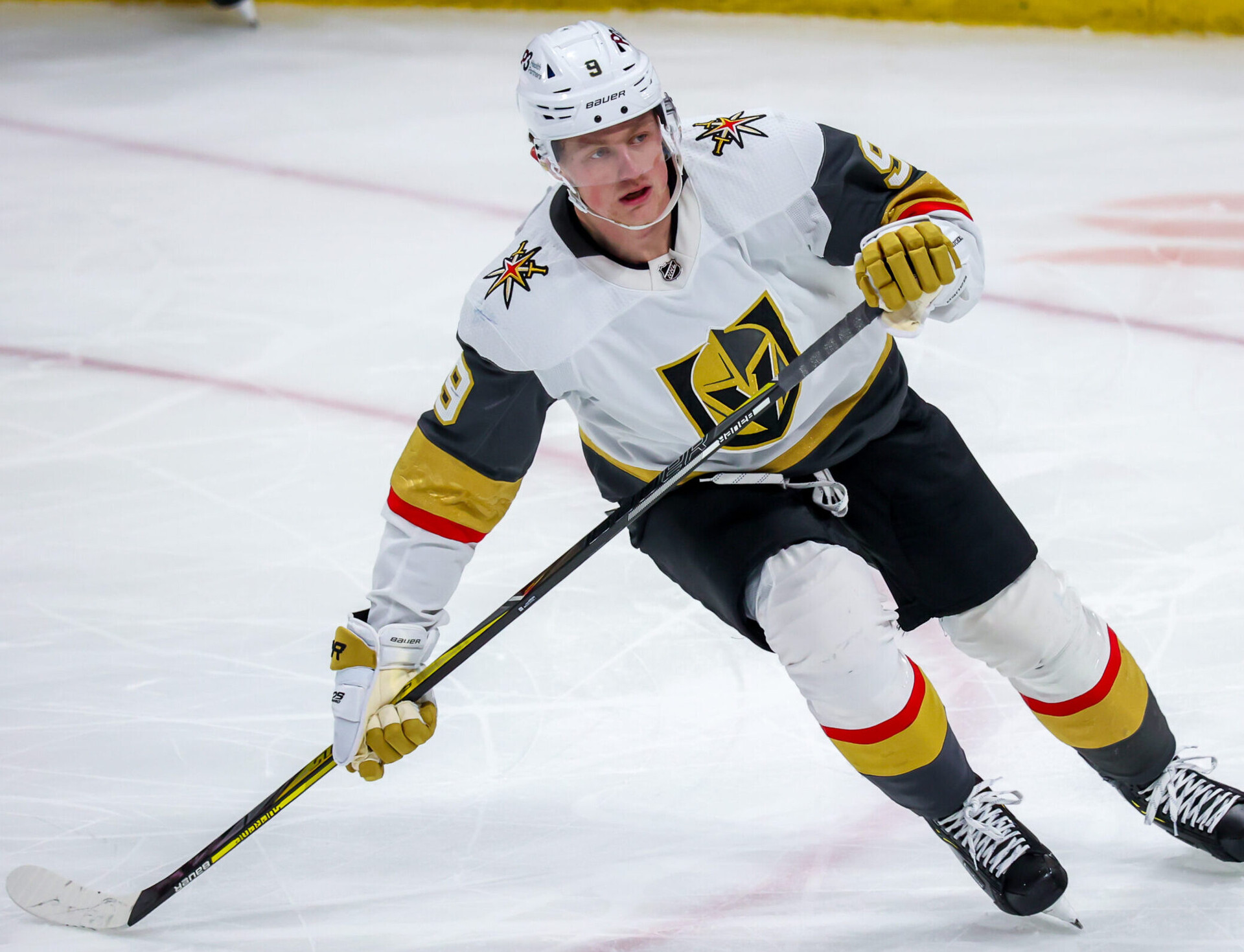 Jack Eichel #9 of the Vegas Golden Knights keeps an eye on the play during third period action against the Winnipeg Jets at Canada Life Centre on March 15, 2022