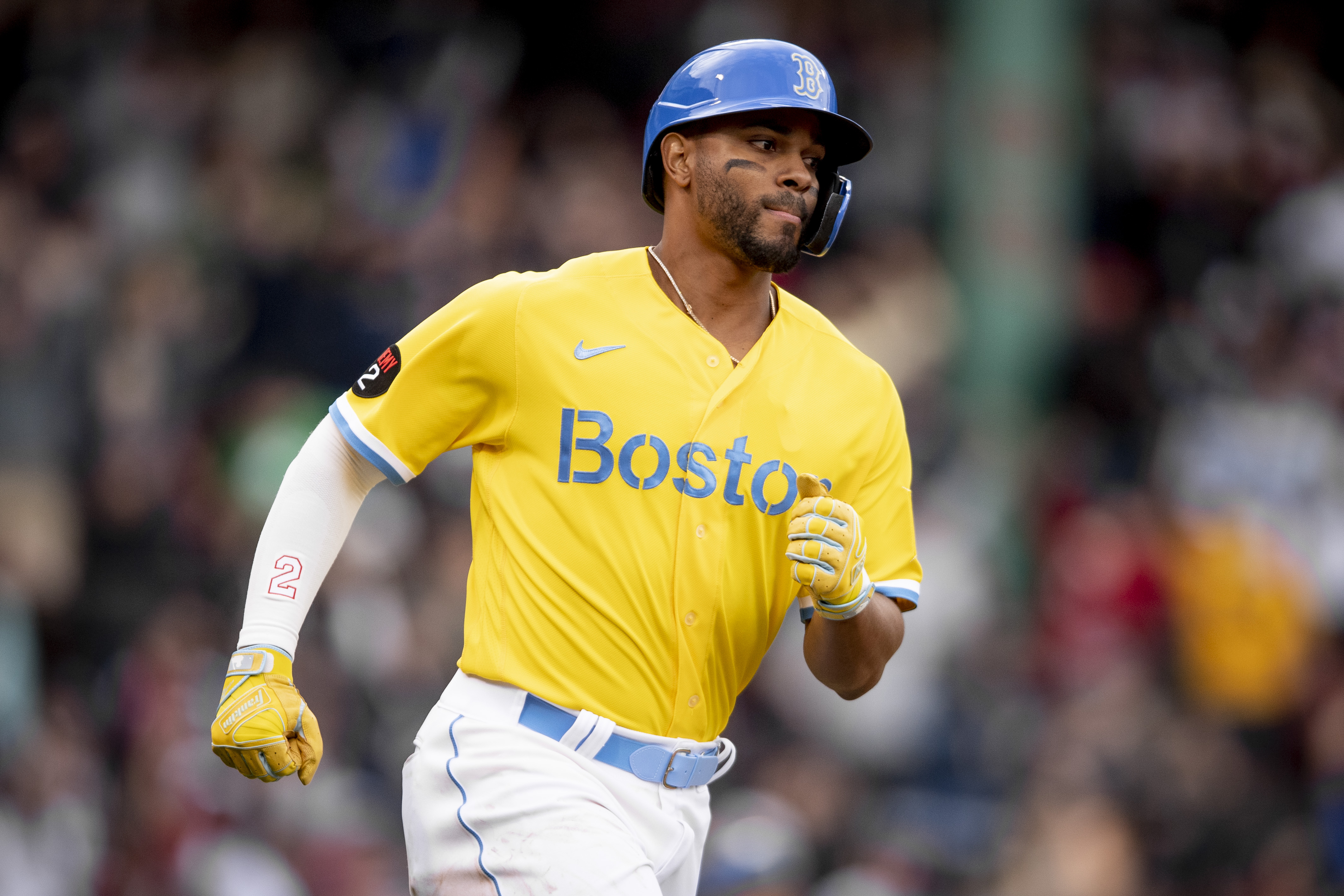 Xander Bogaerts #2 of the Boston Red Sox runs after hitting a two-run home run during the third inning of a game against the Minnesota Twins on April 16, 2022 at Fenway Park in Boston, Massachusetts.