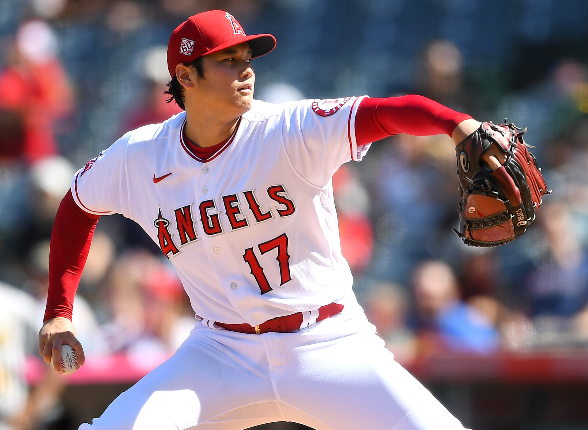 Shohei Ohtani #17 of the Los Angeles Angels pitches in the game against the Oakland Athletics at Angel Stadium of Anaheim on September 19, 2021 in Anaheim, California.