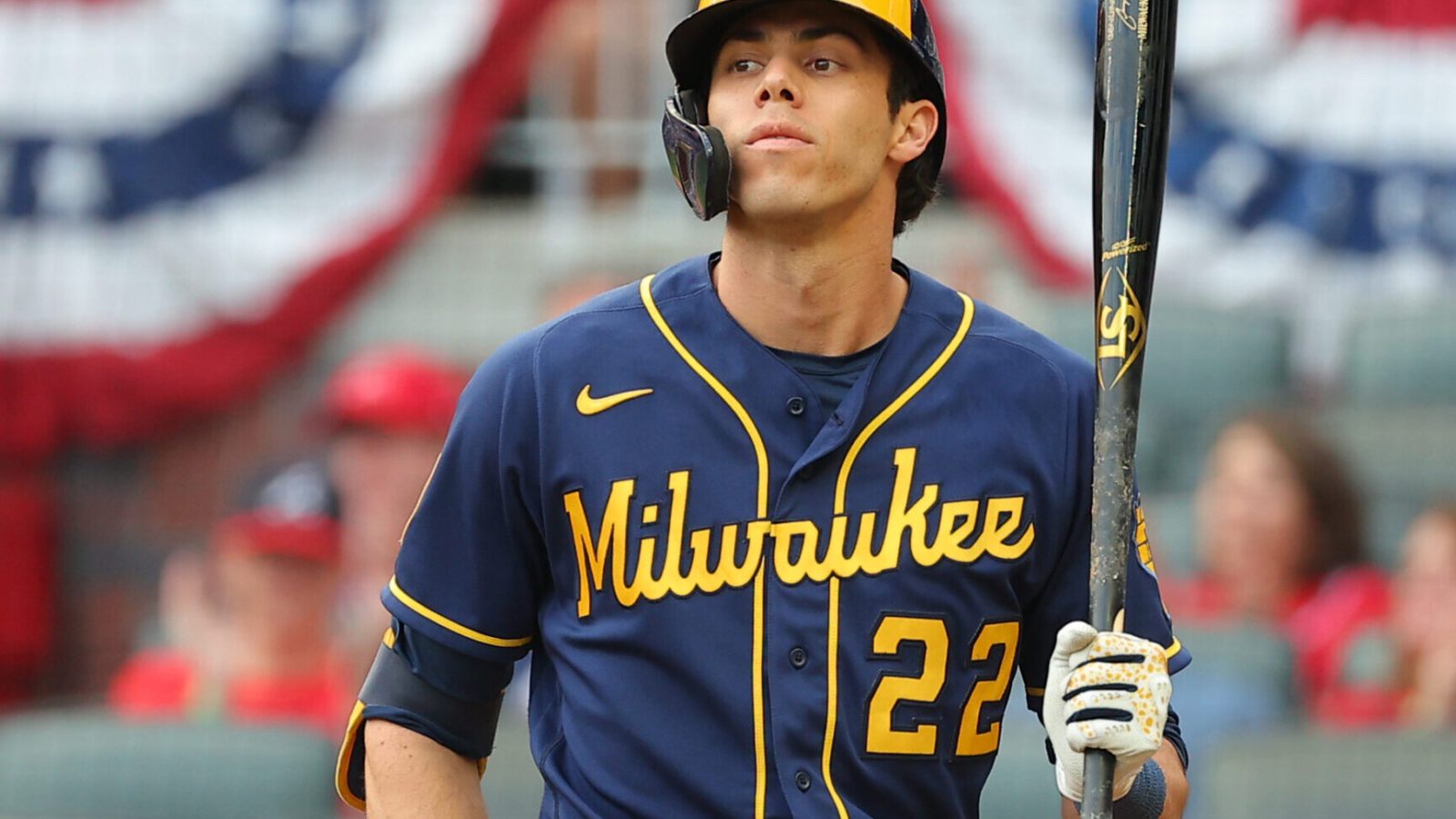 Christian Yelich #22 of the Milwaukee Brewers bats during the second inning against the Atlanta Braves in game four of the National League Division Series at Truist Park on October 12, 2021 in Atlanta, Georgia.