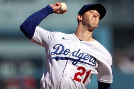 Starting pitcher Walker Buehler #21 of the Los Angeles Dodgers pitches during the 1st inning of the National League Championship Series against the Atlanta Braves at Dodger Stadium