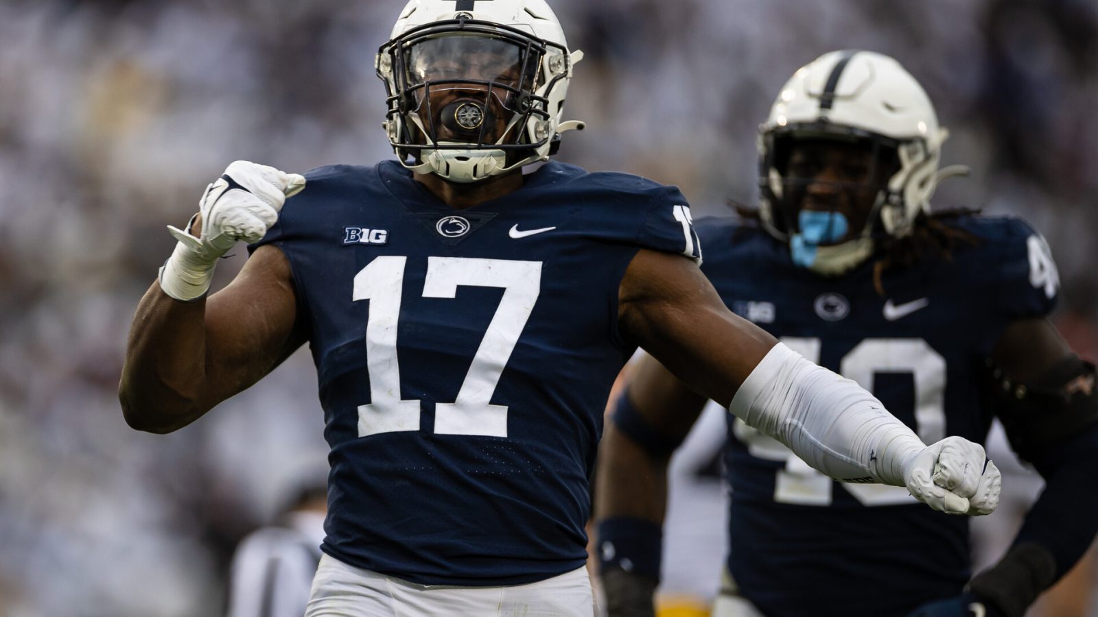 Arnold Ebiketie #17 of the Penn State Nittany Lions celebrates