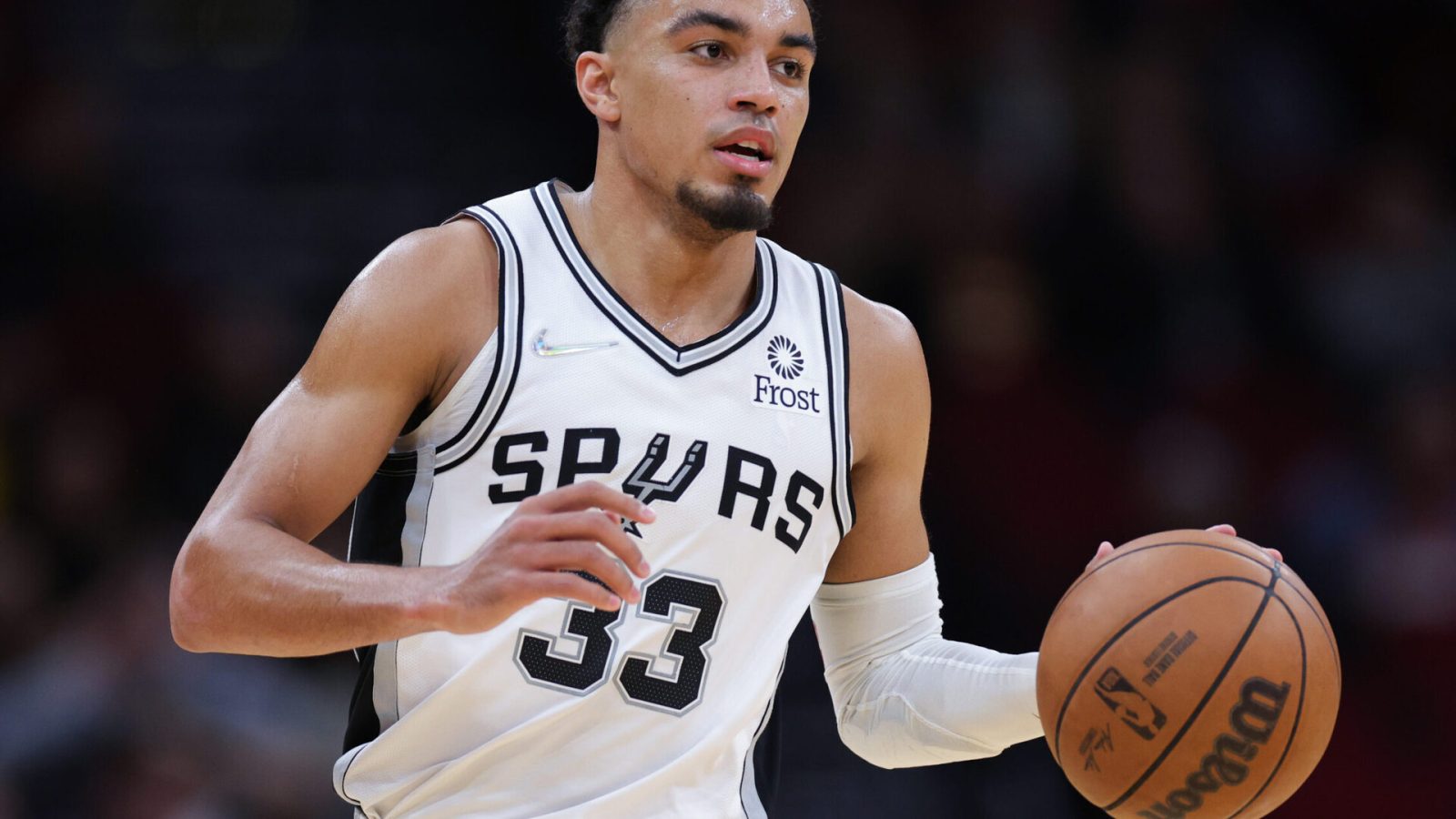Tre Jones #33 of the San Antonio Spurs in action against the Houston Rockets at Toyota Center on January 25, 2022 in Houston, Texas.