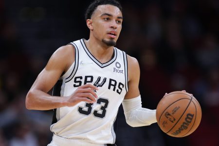 Tre Jones #33 of the San Antonio Spurs in action against the Houston Rockets at Toyota Center on January 25, 2022 in Houston, Texas.