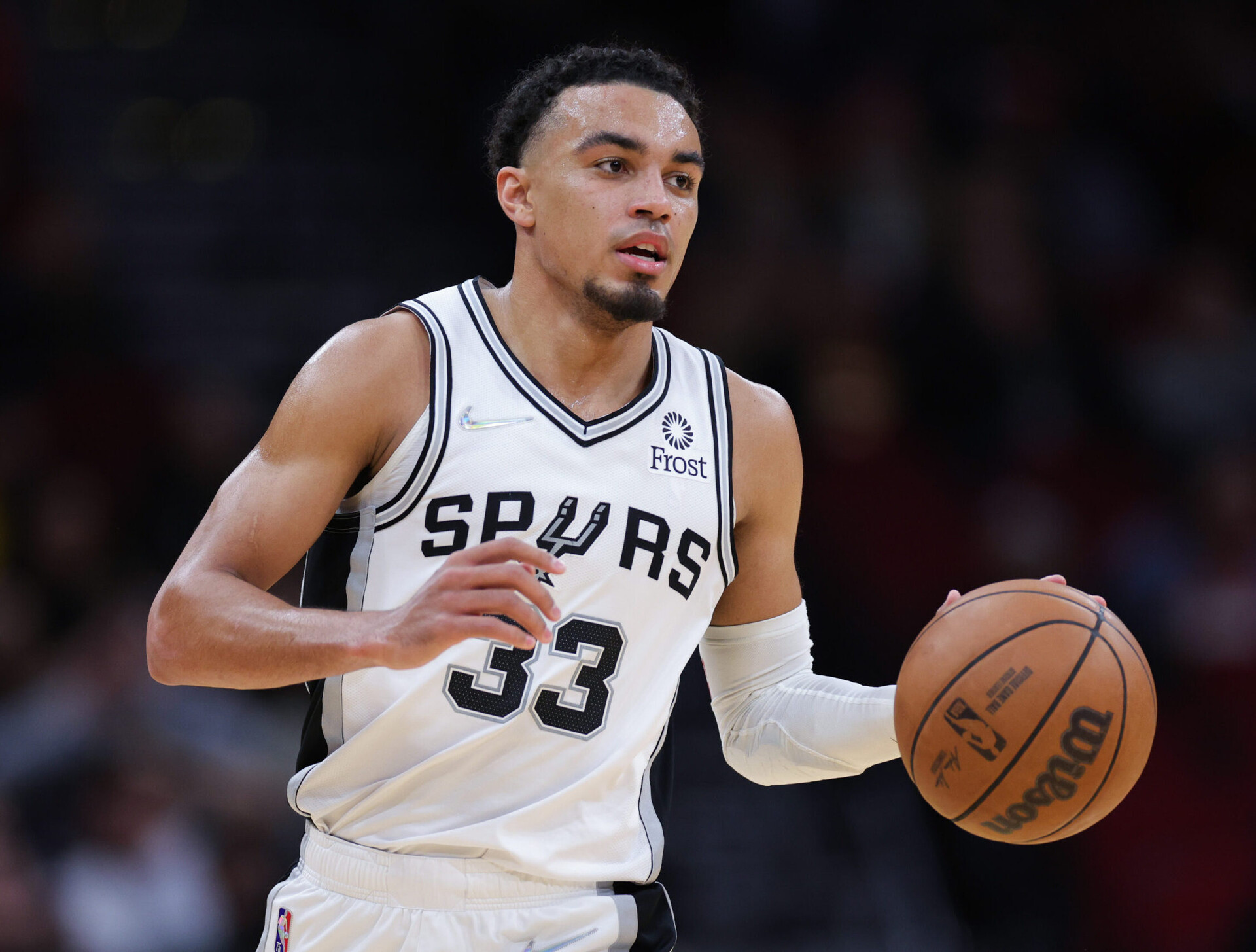 Tre Jones #33 of the San Antonio Spurs in action against the Houston Rockets at Toyota Center on January 25, 2022 in Houston, Texas.
