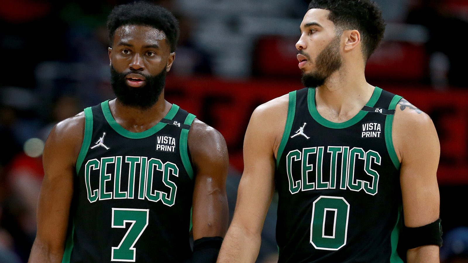 Jaylen Brown #7 of the Boston Celtics and Jayson Tatum #0 of the Boston Celtics stands on the court during the third quarter of an NBA game against the New Orleans Pelicans at Smoothie King Center on January 29, 2022 in New Orleans, Louisiana.