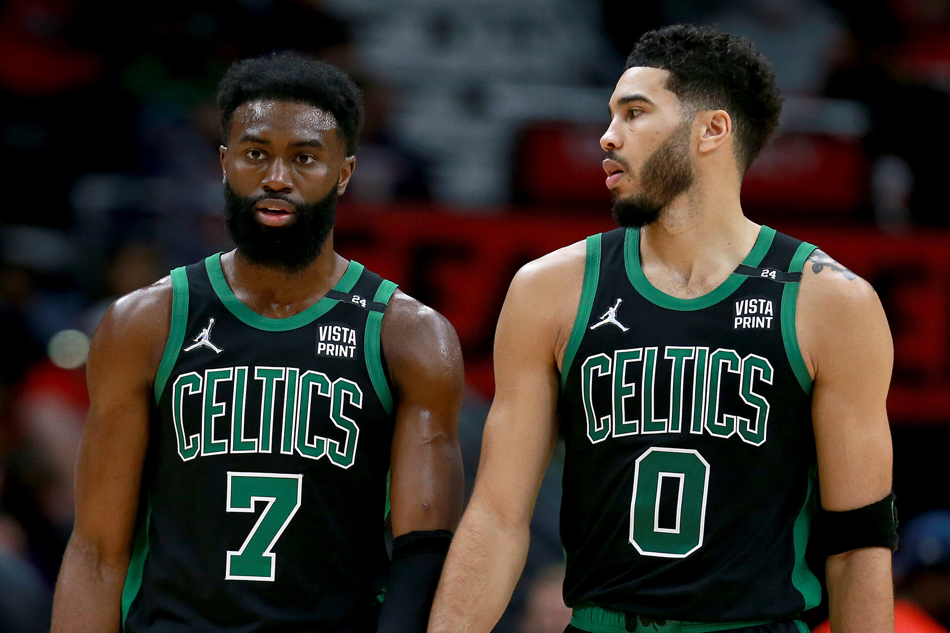 Jaylen Brown #7 of the Boston Celtics and Jayson Tatum #0 of the Boston Celtics stands on the court during the third quarter of an NBA game against the New Orleans Pelicans at Smoothie King Center on January 29, 2022 in New Orleans, Louisiana.