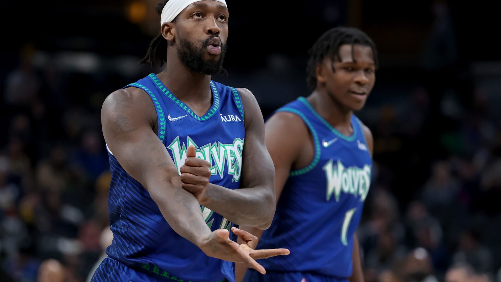 Patrick Beverley #22 of the Minnesota Timberwolves celebrates in the fourth quarter against the Indiana Pacers at Gainbridge Fieldhouse on February 13, 2022 in Indianapolis, Indiana.