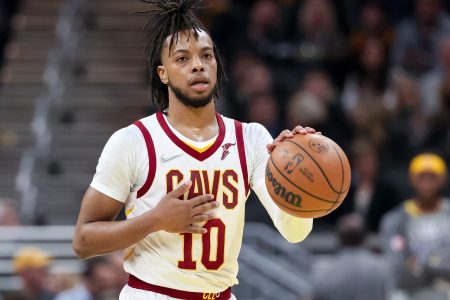 Darius Garland #10 of the Cleveland Cavaliers dribbles the ball in the first quarter against the Indiana Pacers at Gainbridge Fieldhouse on March 08, 2022 in Indianapolis, Indiana.
