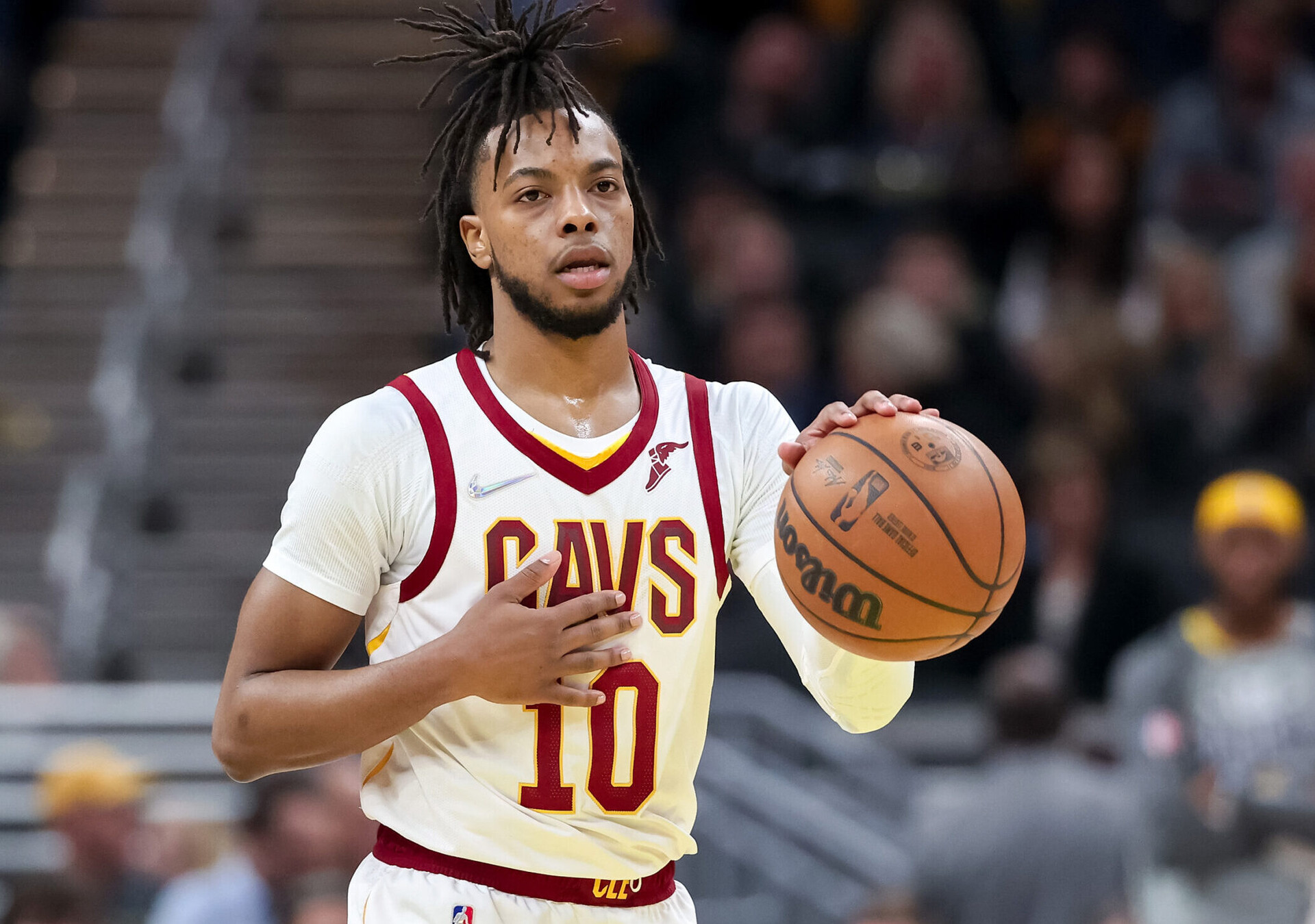 Darius Garland #10 of the Cleveland Cavaliers dribbles the ball in the first quarter against the Indiana Pacers at Gainbridge Fieldhouse on March 08, 2022 in Indianapolis, Indiana.