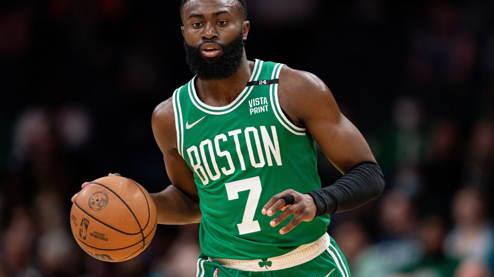 Jaylen Brown #7 of the Boston Celtics brings the ball up court against the Charlotte Hornets during their game at Spectrum Center on March 09, 2022 in Charlotte, North Carolina.