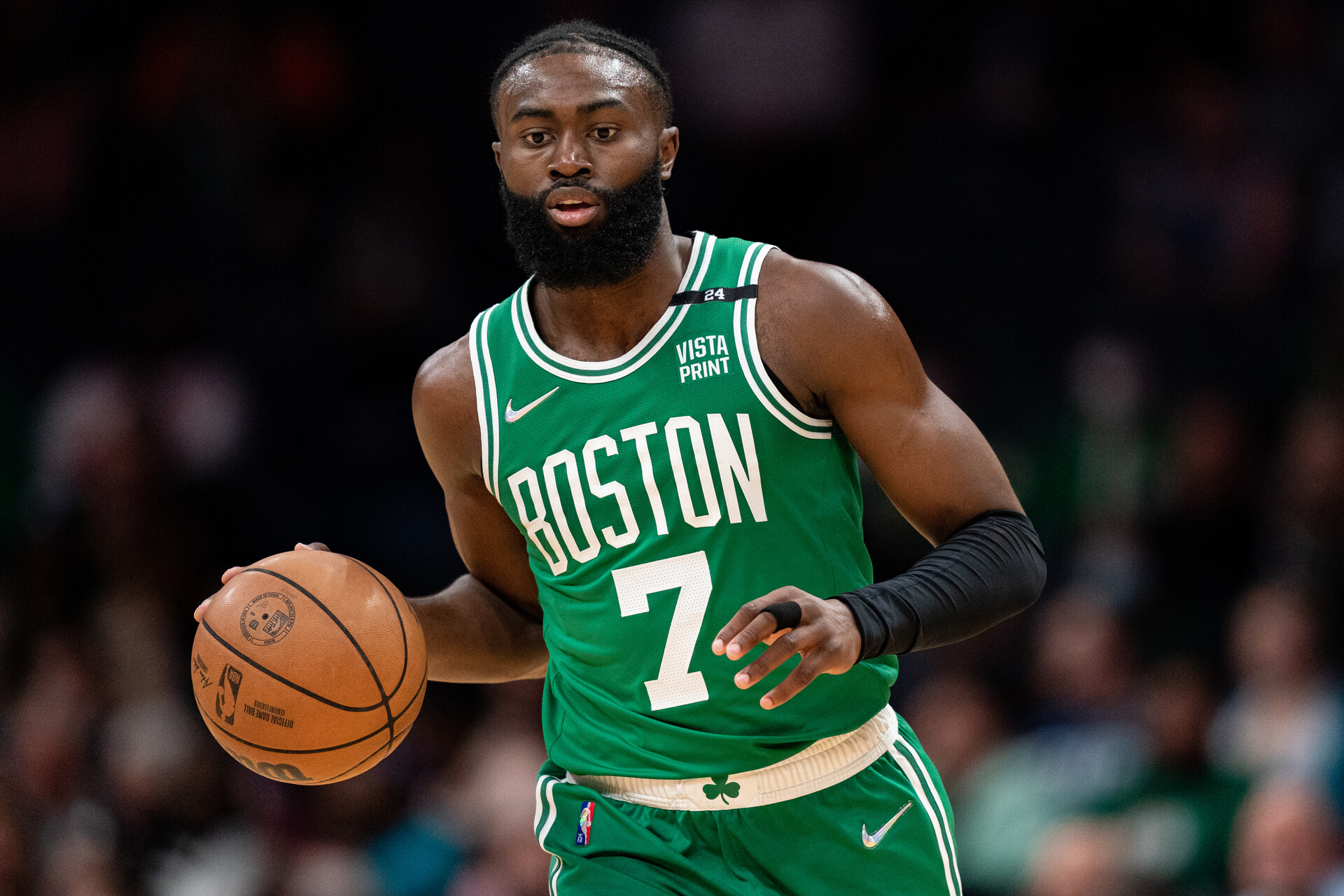 Jaylen Brown #7 of the Boston Celtics brings the ball up court against the Charlotte Hornets during their game at Spectrum Center on March 09, 2022 in Charlotte, North Carolina.